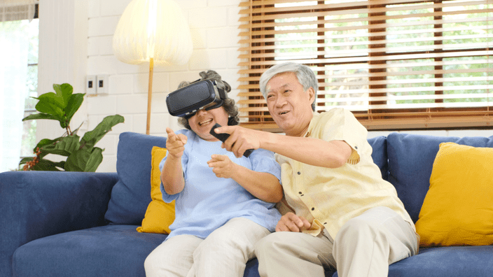 elderly couple using AR tech